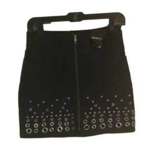 Forever 21 short denim black skirt. Super cute rivet type accents. Size small.